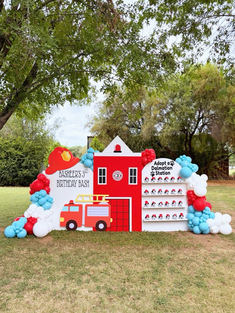 Firetruck and Dalmatian themed 3rd birthday balloon backdrop by AZ Party Co.